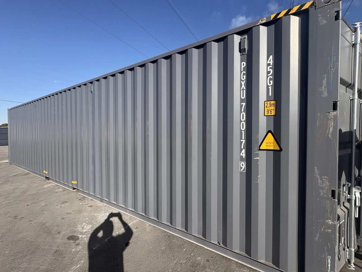 40ft High Cube Shipping Container – New / One-Trip – angled exterior side view with cargo doors mostly cropped