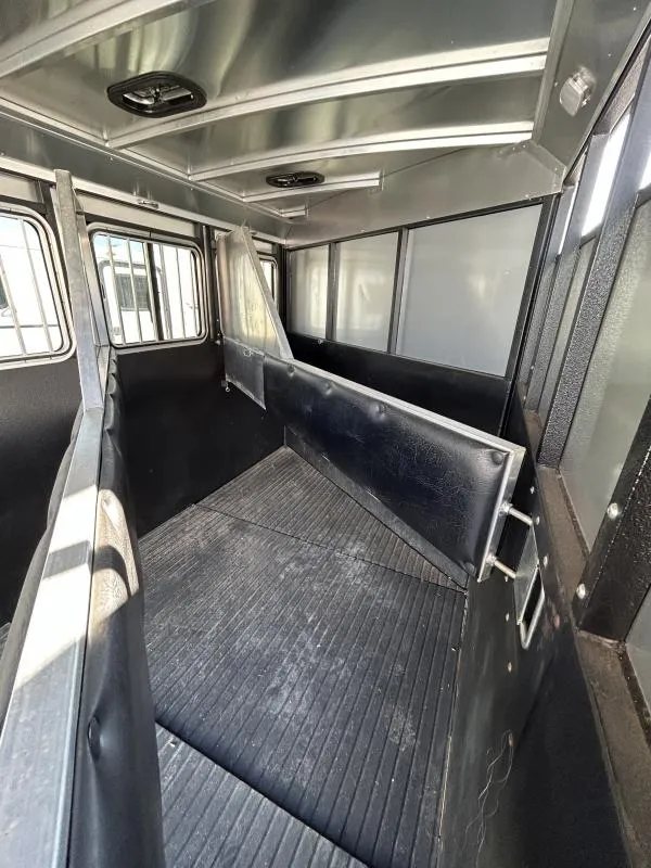 2022 Logan Coach Crossfire 3 Horse Trailer – Swing-Out Saddle Rack – Horse stalls separated by padded dividers with drop-down window bars