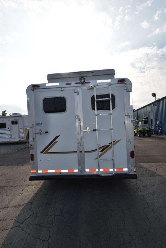 2008 C and C Trailers 4 Horse Bumper Pull – Hay Pod – Rear view of the horse trailer showing closed doors and an access ladder