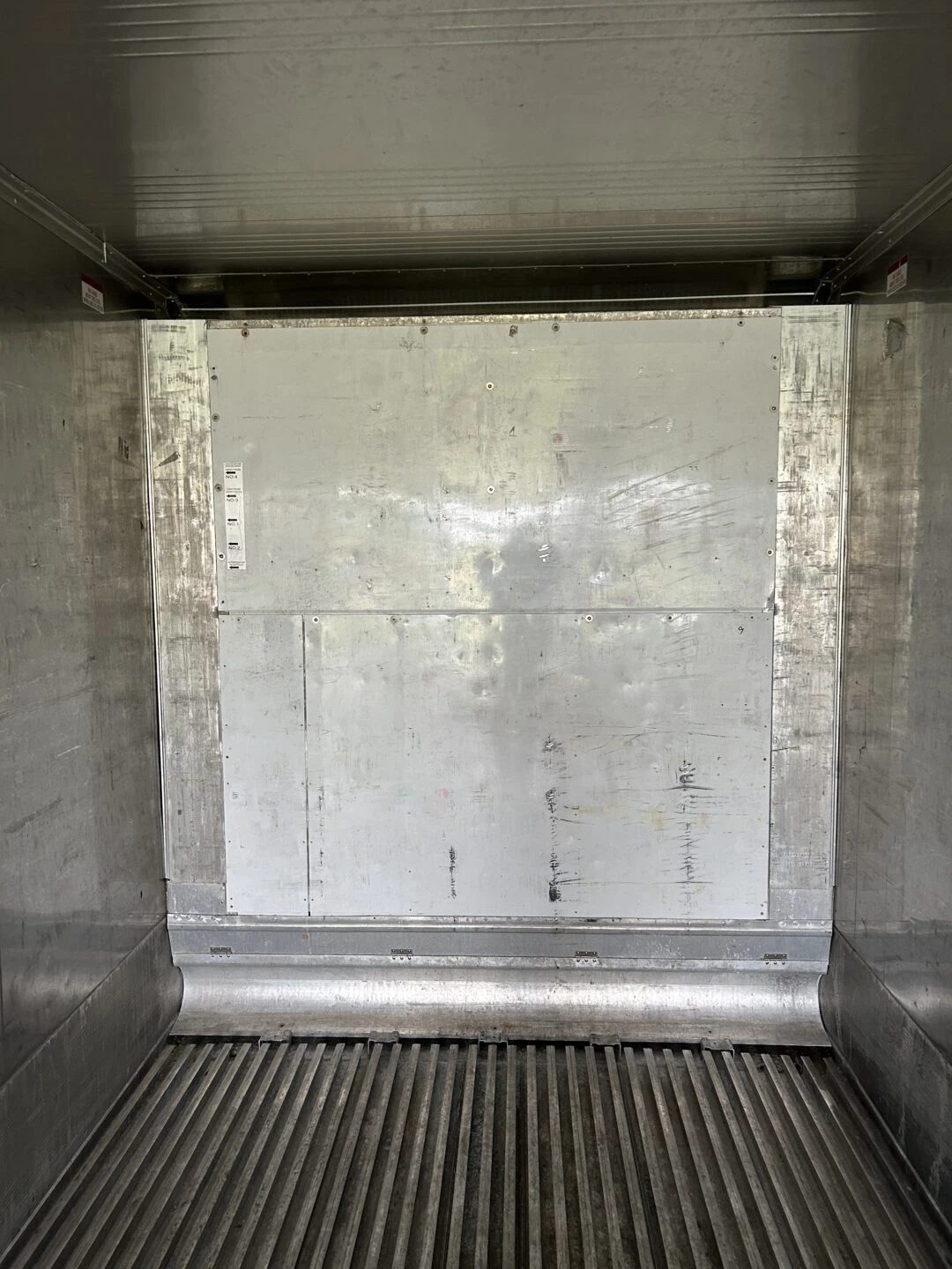 40ft High Cube Refrigerated Container – Insulated Storage – empty refrigerated container interior with metal bulkhead and ribbed floor