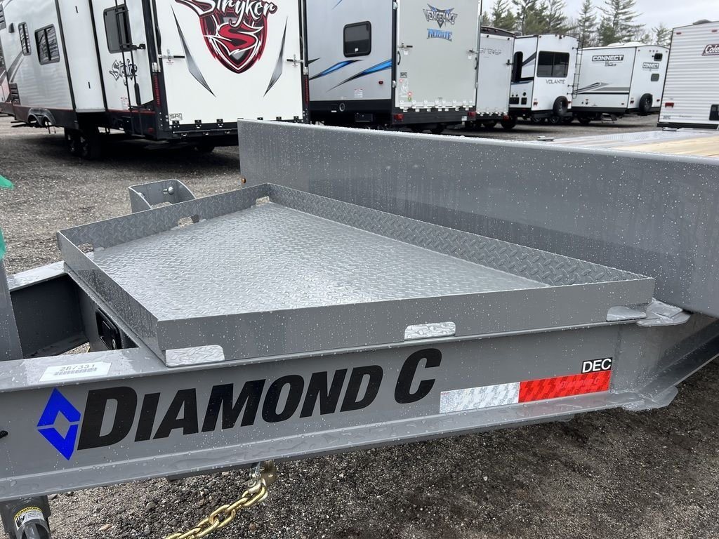 2024 Diamond C Deckover Equipment Trailer – Cement Gray – Close-up of the gray metal storage tray area on the trailer frame