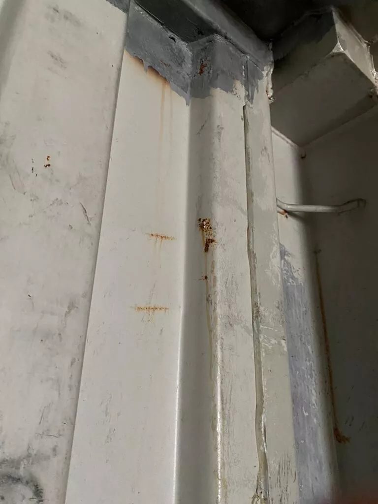 40ft Used Shipping Container – Standard Dry Storage – container interior corner with rust spots and patched seams