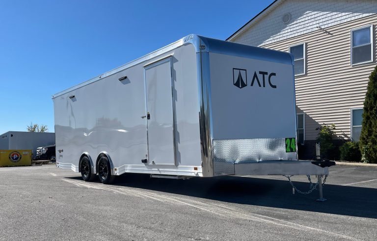 2026 ATC 24 ft ROM 550 – Lithium Power – Front three-quarter view from the curbside showing the side entry door