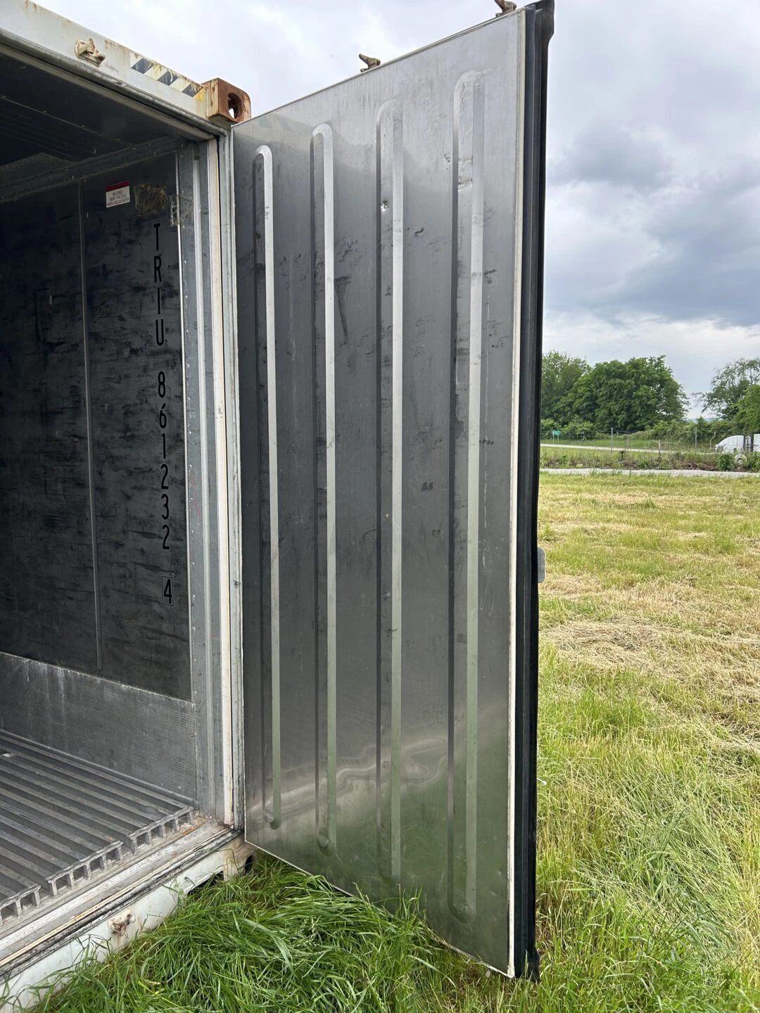 40ft High Cube Refrigerated Container – Insulated Storage – open refrigerated container door with metal interior and ribbed floor