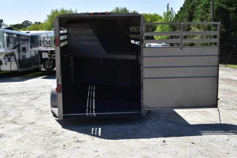 2017 CM 3HSLBP 3 Horse Trailer – Galvanneal, Dressing Room – Rear view of the horse trailer with the single rear door swung wide open