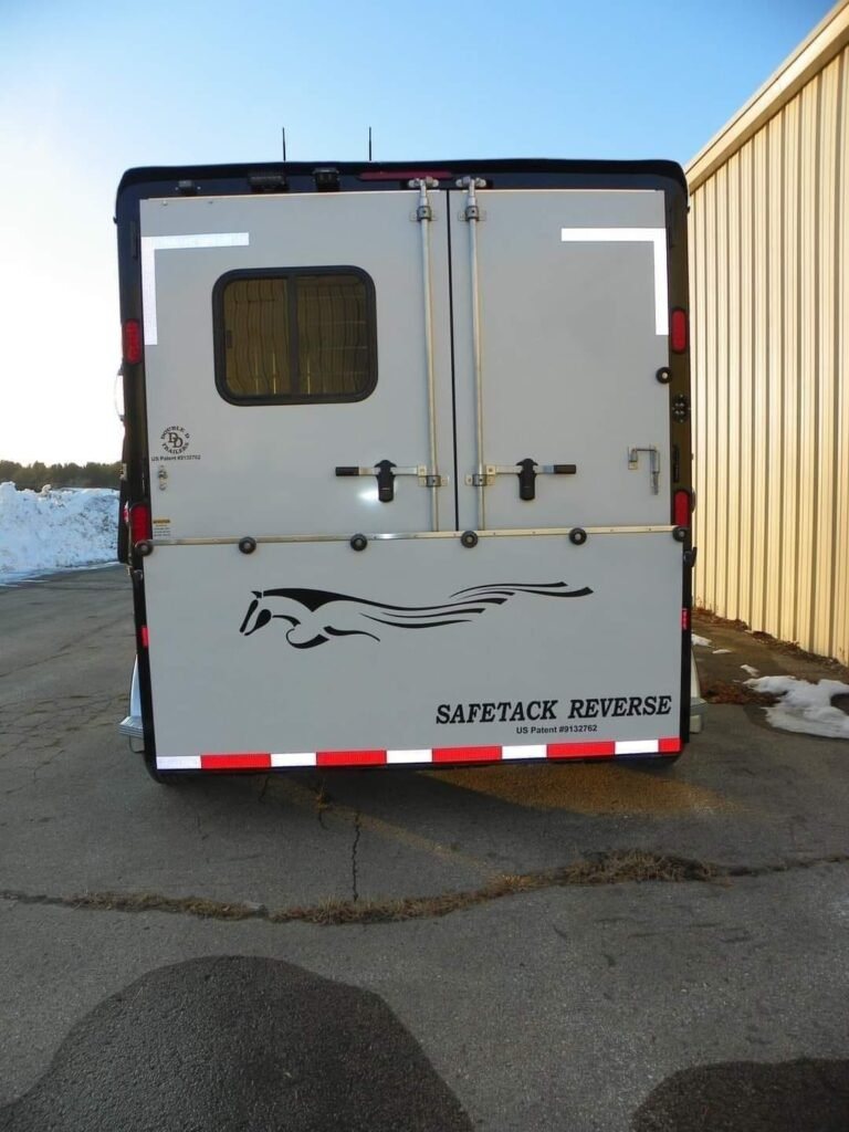 2022 Double D 2 Horse Bumper Pull – Reverse Slant – Direct rear view of closed trailer doors and ramp graphics