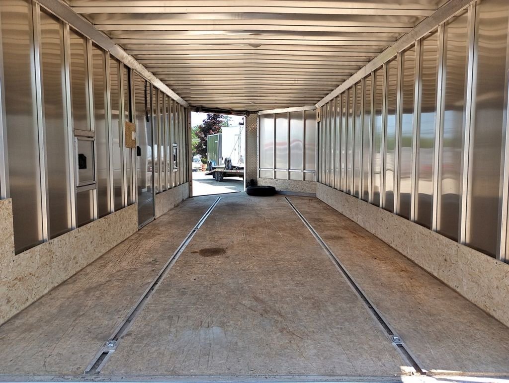 Mission Trailers 22 ft Snowmobile Trailer – 4-Place – Interior view looking toward the open front door of the long trailer