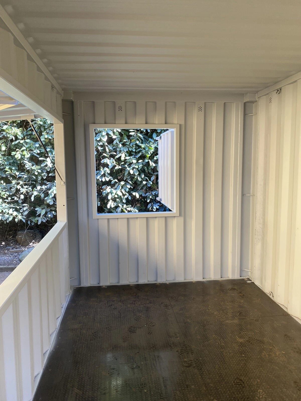 15ft Custom Container Bar & Kiosk – Side Service Hatches – empty container interior with open service hatch and window (9)
