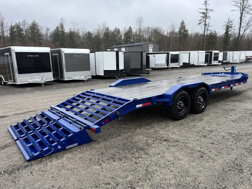 2022 Diamond C 24 ft Equipment Trailer – Max Ramps – Three-quarter rear view of the trailer with the ramps deployed to the ground