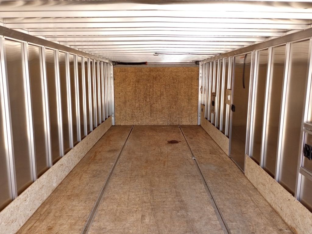 Mission Trailers 22 ft Snowmobile Trailer – 4-Place – Interior view of the trailer looking toward the front with aluminum wall studs