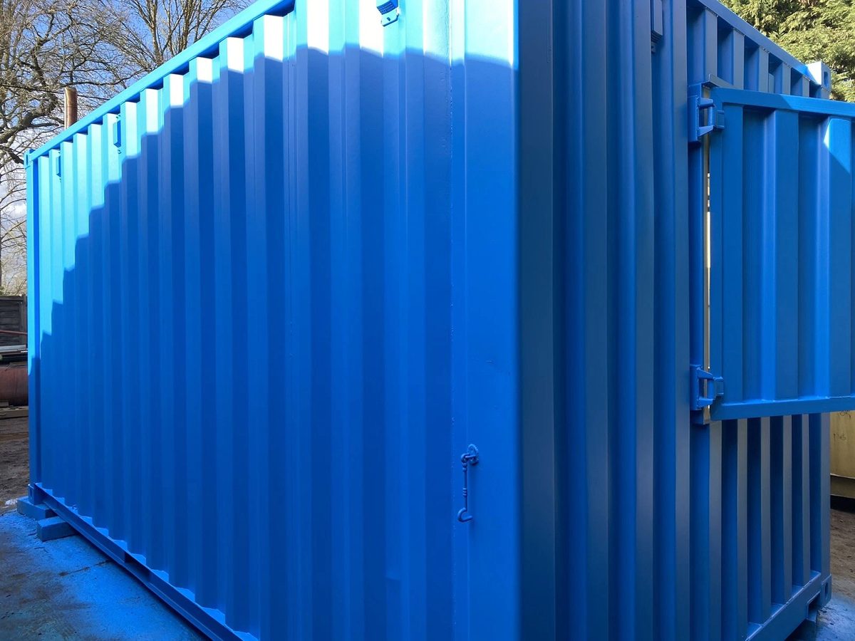 15ft Custom Container Bar & Kiosk – Side Service Hatches – blue container exterior with partially open side hatch