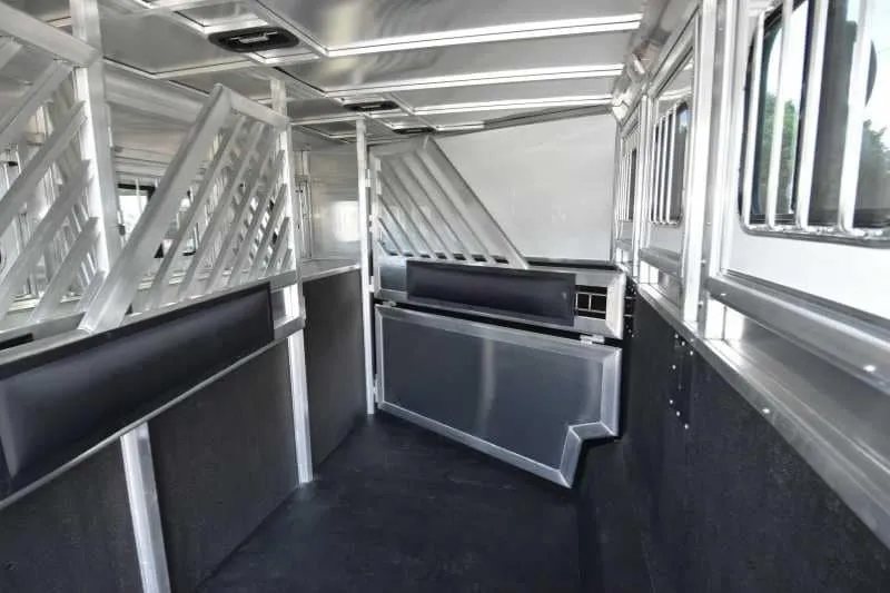 2018 Lakota 4 Horse Trailer – 2 ft Short Wall – Horse area interior with aluminum dividers and drop down feed windows