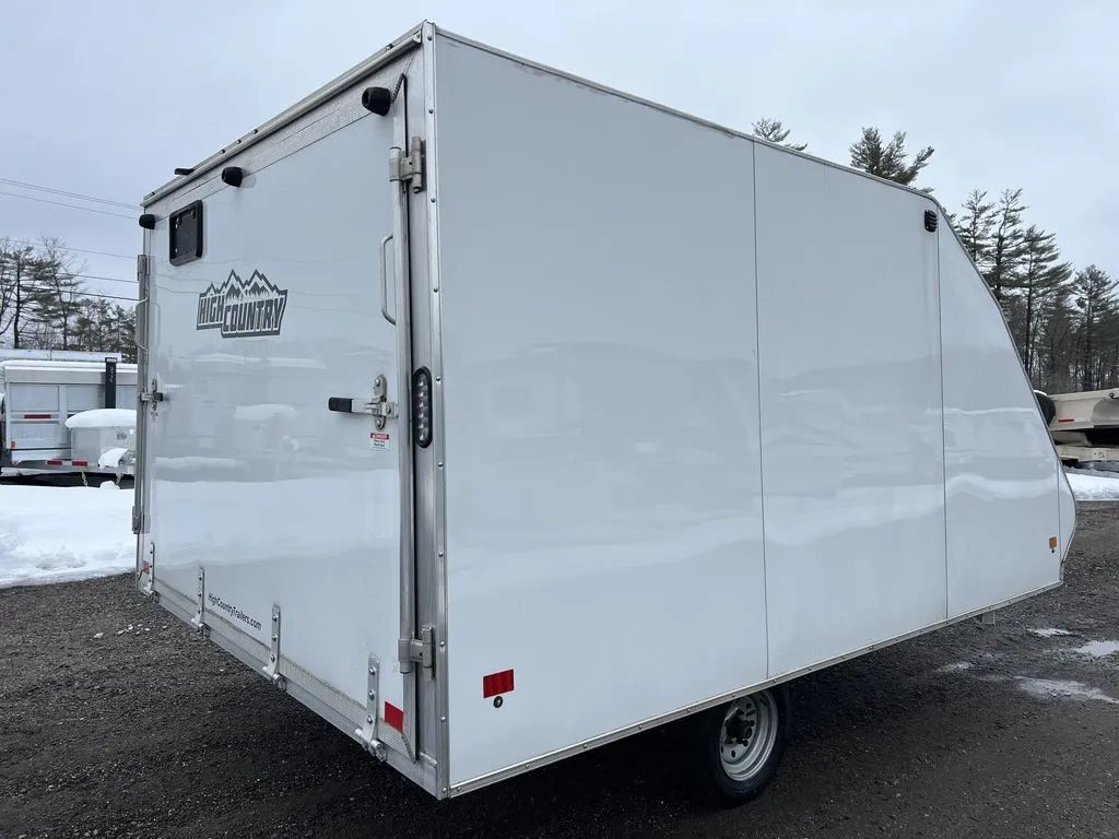 2022 High Country 12 ft Hybrid Trailer – Track Mats – Rear three-quarter view from the passenger side with doors closed