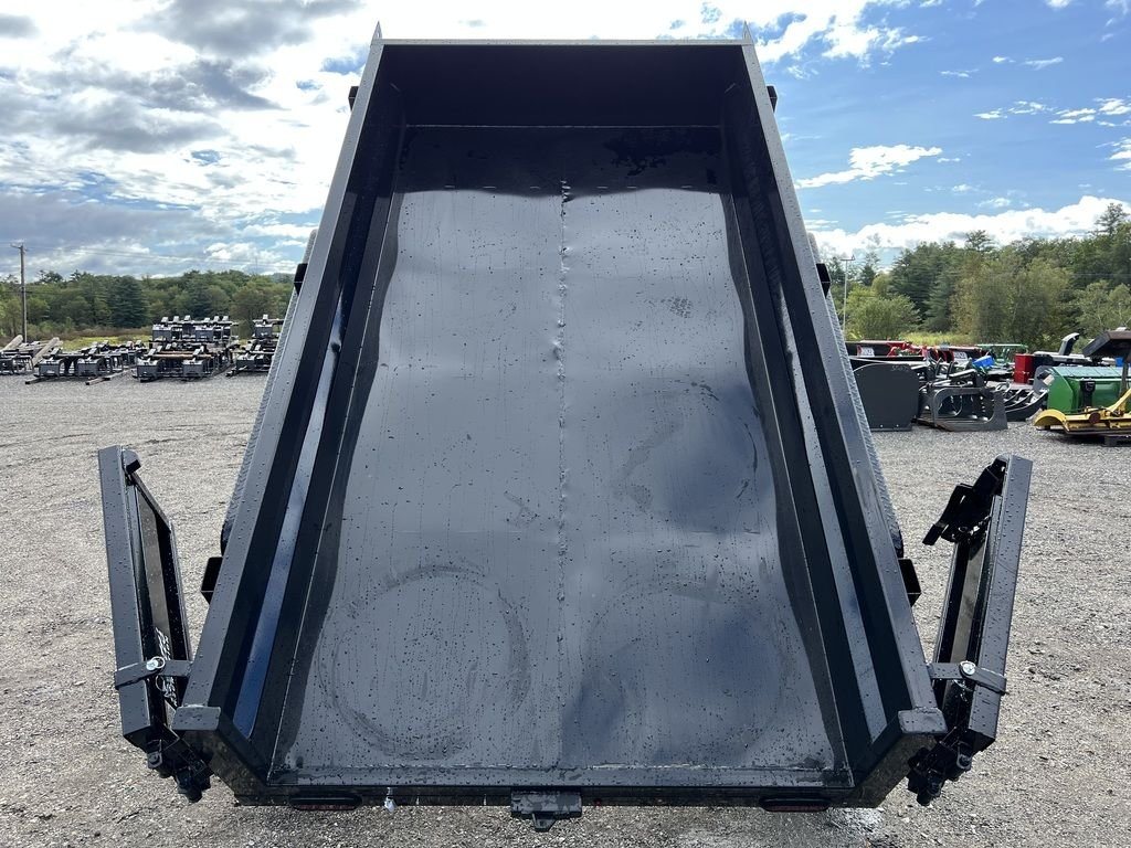 2024 Griffin Trailers 10 ft Dump – Barn Door Gate – View looking into the empty bed of the raised black dump trailer