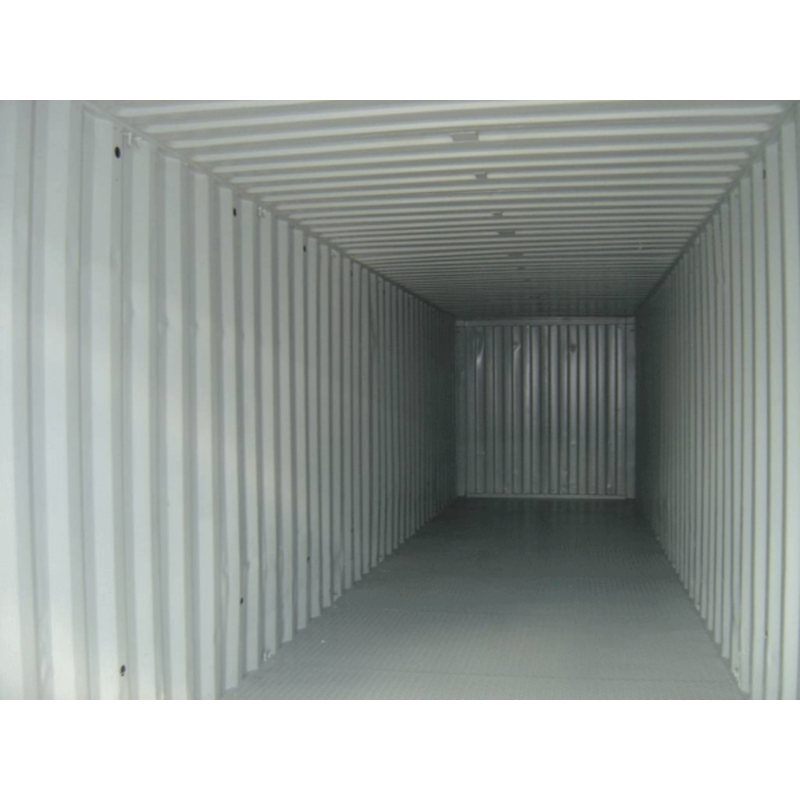 40 ft Bunded Storage Container – Blue – Interior view of a light grey shipping container with corrugated metal walls
