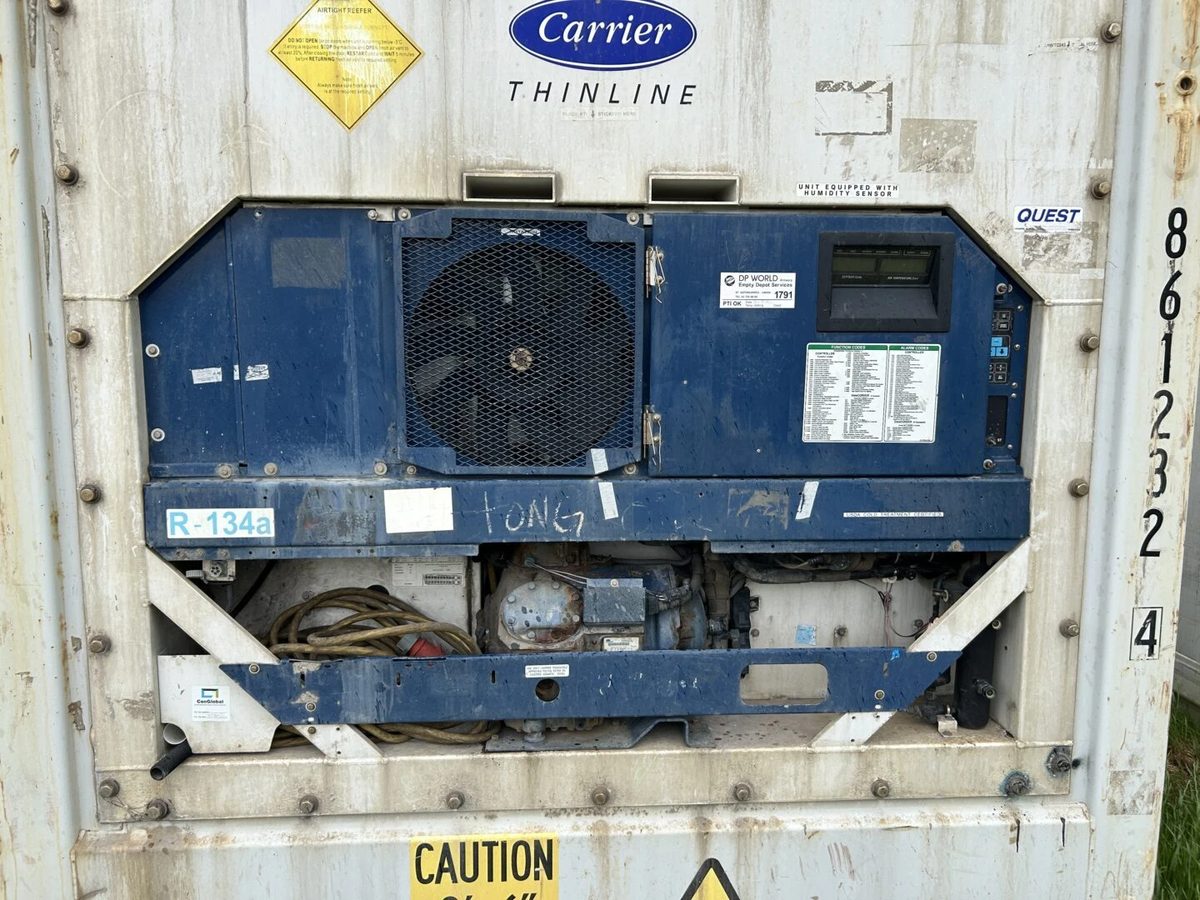 40ft High Cube Refrigerated Container – Insulated Storage – close-up of weathered container refrigeration machinery and controls
