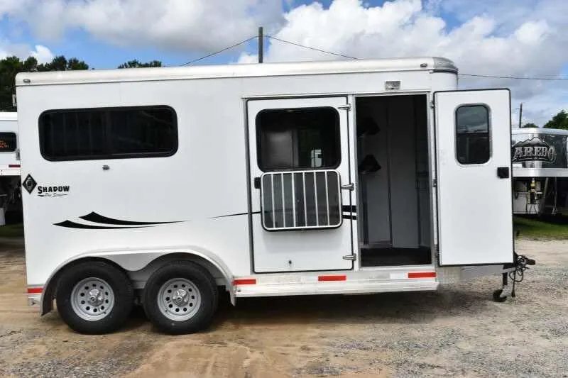 2016 Shadow 2 Horse Trailer – Aluminum, Dressing Room – Right side view of the trailer with the tack room door wide open