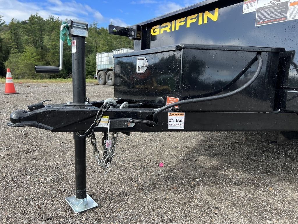 2024 Griffin Trailers 10 ft Dump – Barn Door Gate – Close-up view of the trailer coupler, jack, and safety chains