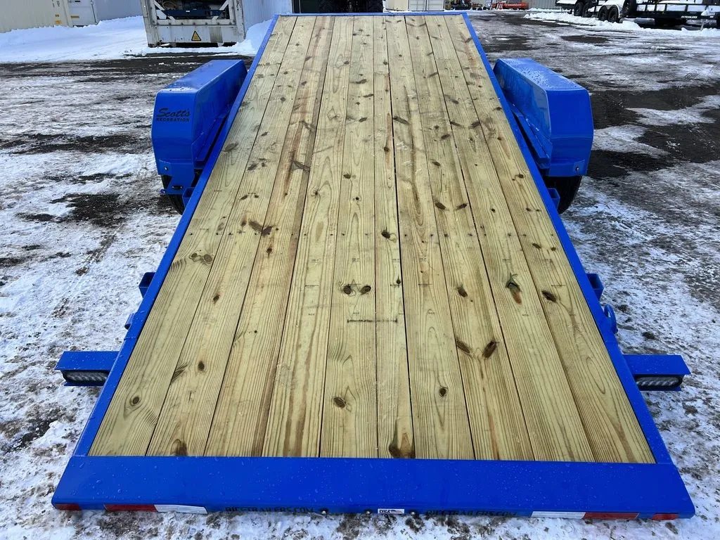 2024 Rice Trailers 20 ft Tilt Trailer – Spare Mount – Straight-on rear view looking up the wood-planked deck of the tilted trailer