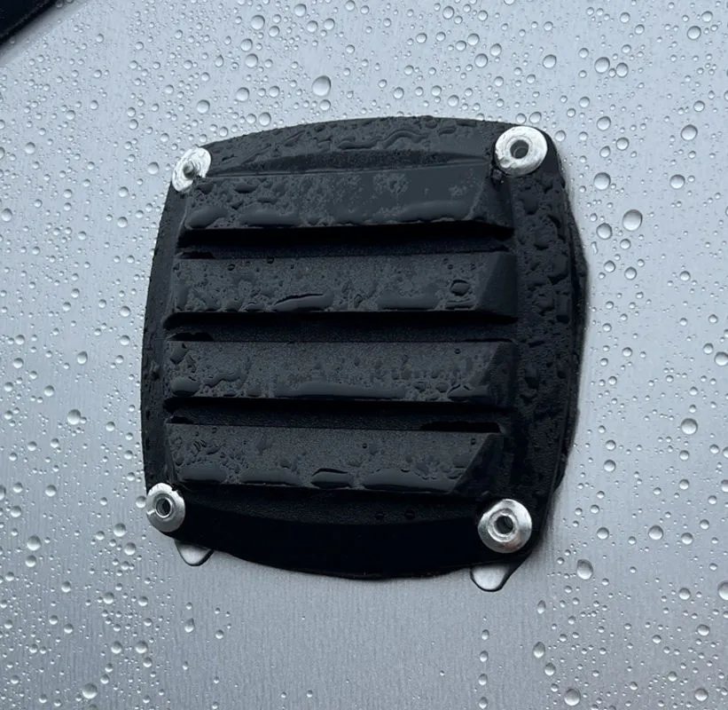 2024 Mission Trailers Crossover Trailer – Galvanized Package – Close-up of a black plastic flow-through vent on the trailer side