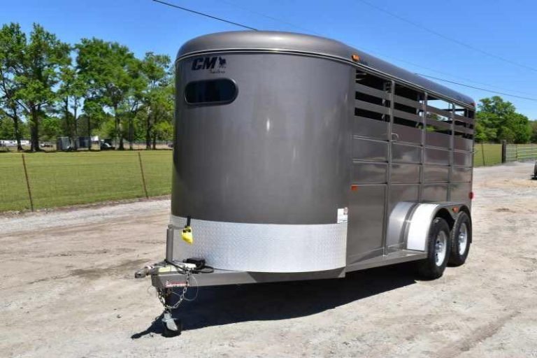 2017 CM 3HSLBP 3 Horse Trailer – Galvanneal, Dressing Room – Front three-quarter view of the gray horse trailer showing hitch and left side