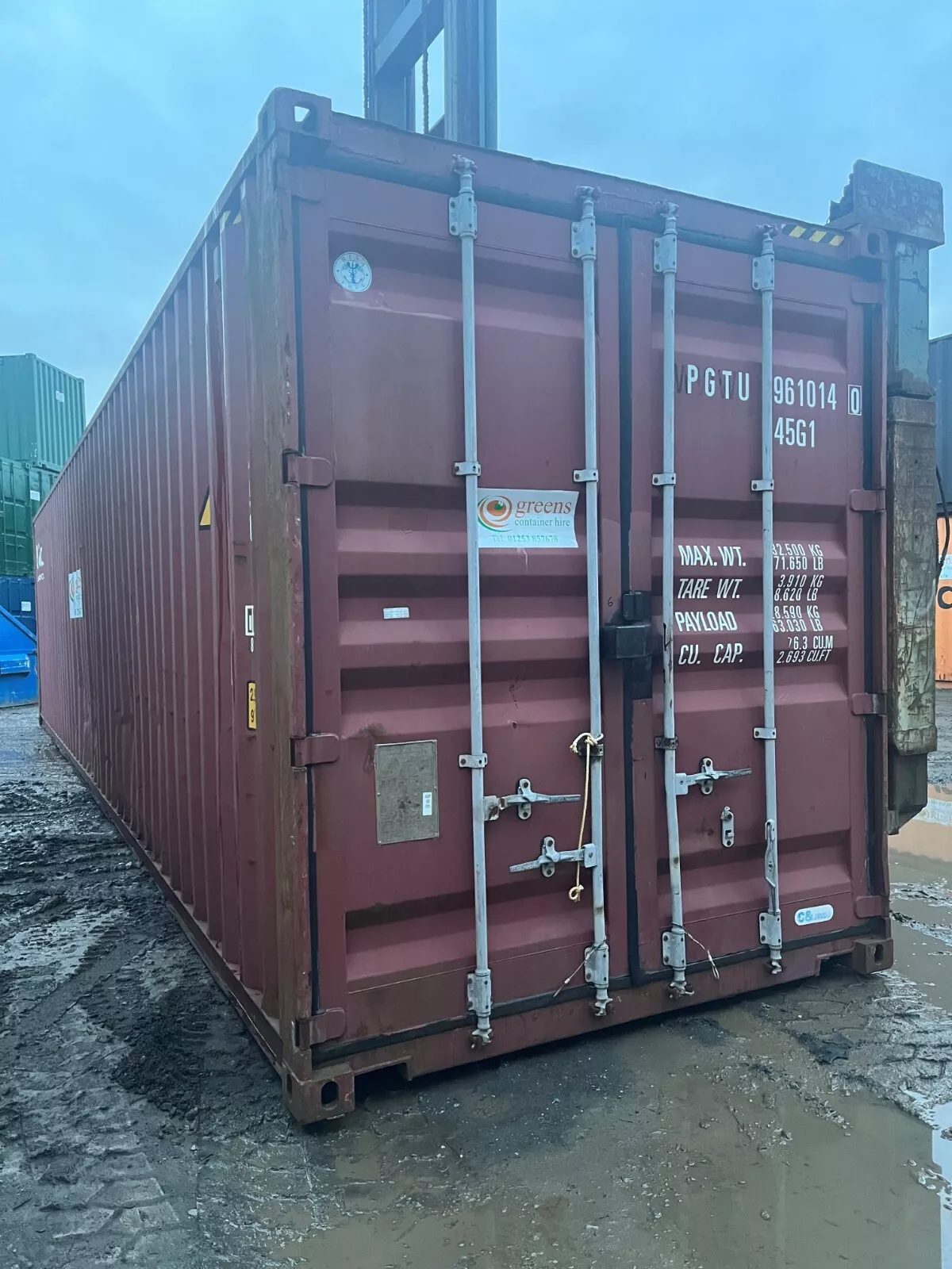 40ft Used High Cube Shipping Container – Lockable Cargo Doors – three-quarter exterior view of weathered container with closed cargo doors