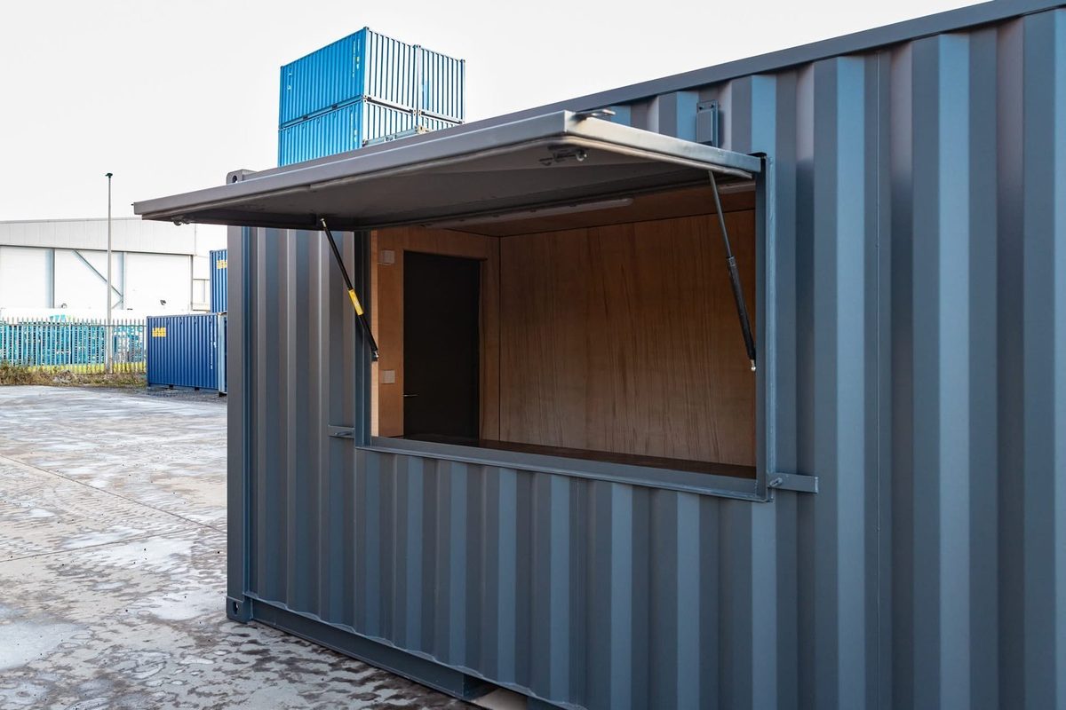 20ft Custom Container Kiosk – Serving Hatch and Insulated Interior – grey container kiosk with raised serving hatch and wooden interior