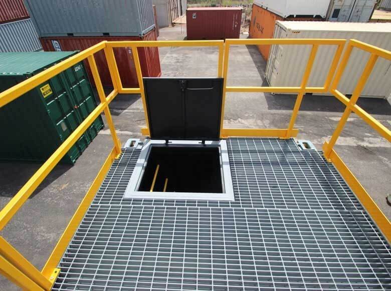 Trade Show Display Container – Lockable Steel Booth – Roof walkway with an open access hatch leading inside the container unit