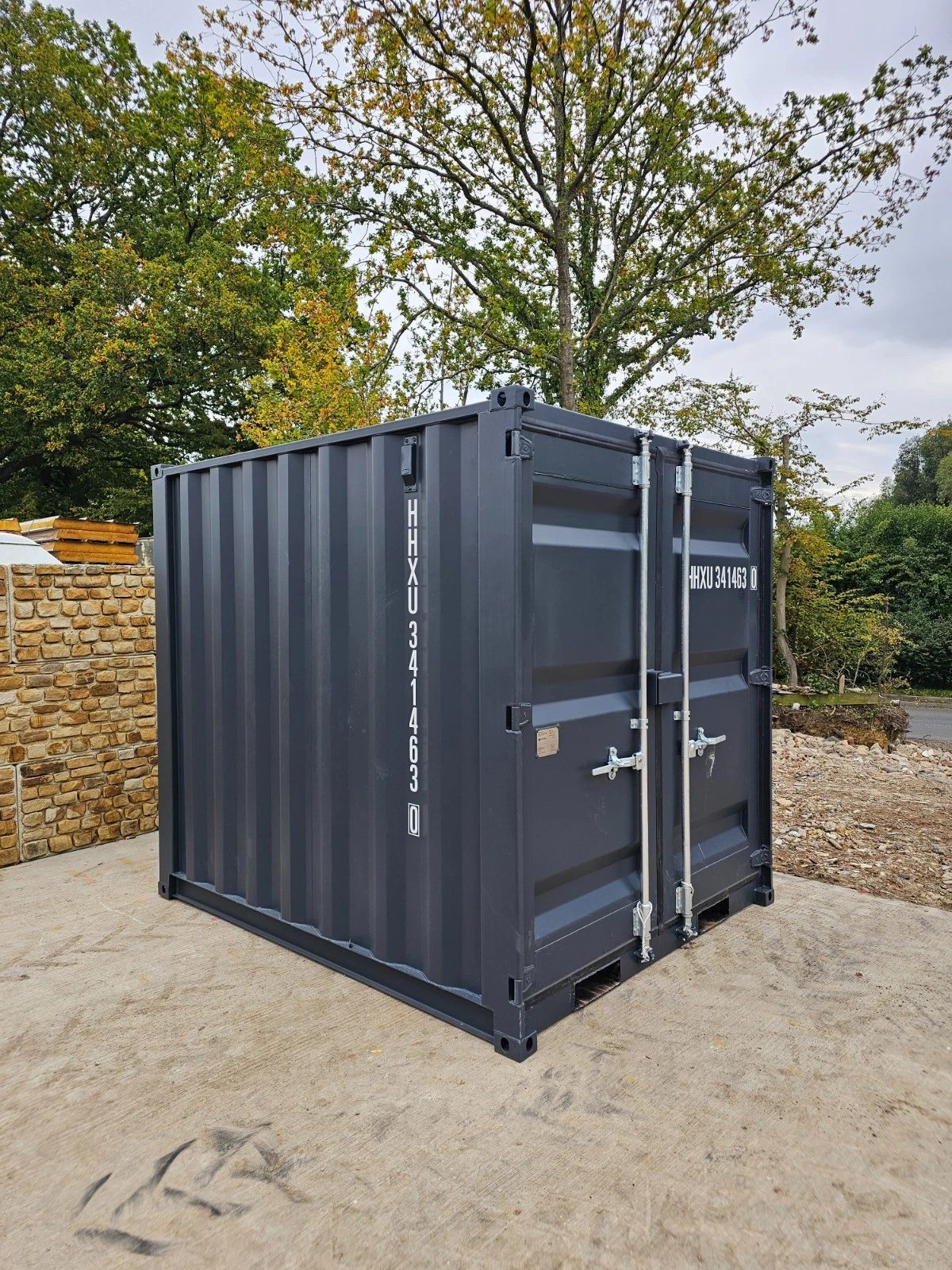 8ft New Shipping Container – Lockbox and Barred Windows – three-quarter exterior view of compact container with doors closed