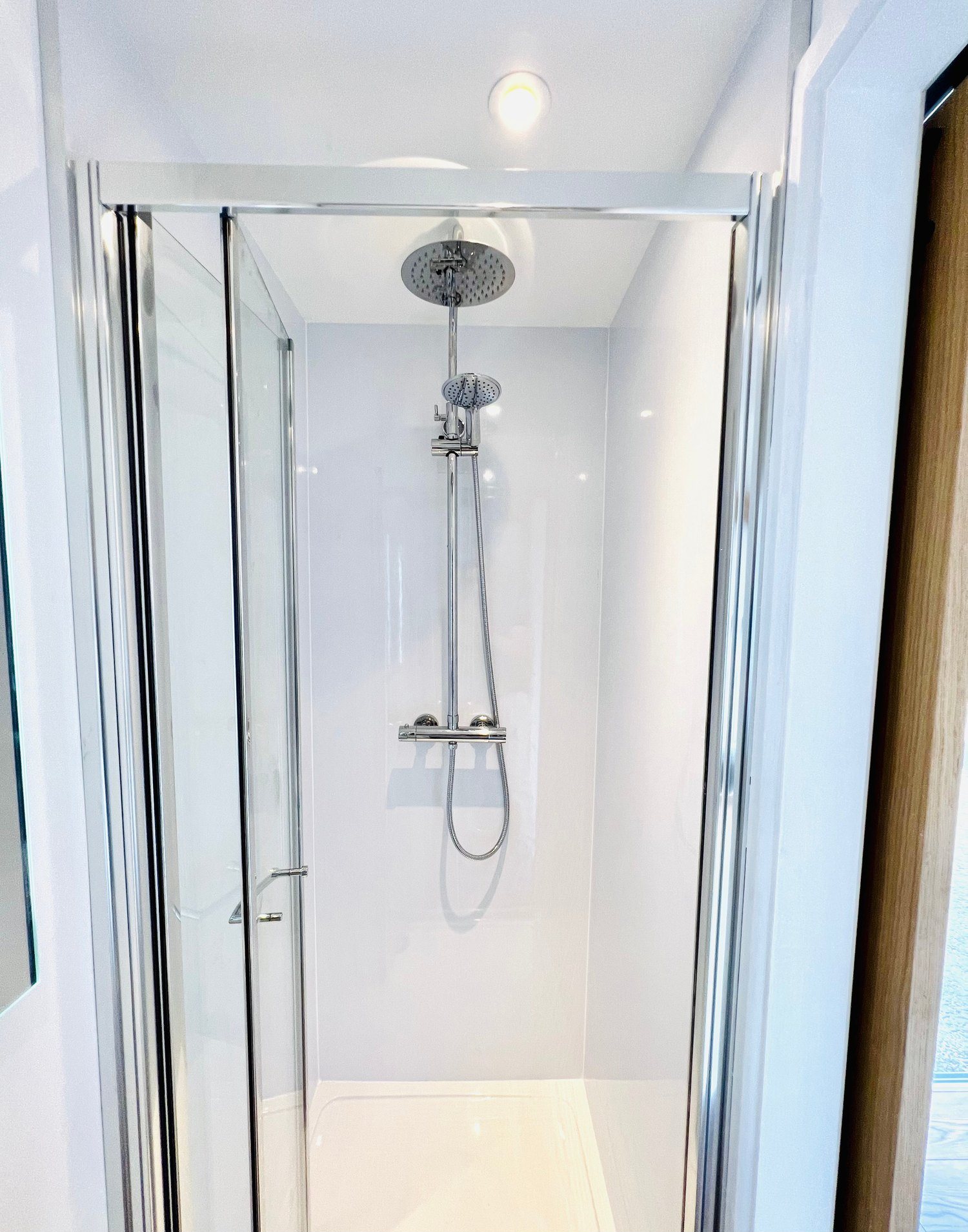20ft Container Home – One Bed Box, 1 Bedroom – A sleek, space-saving walk-in shower provides full-sized comfort within the 20ft shipping container home annex