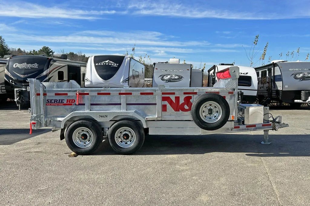 2024 N&N Trailers 14 ft Dump – Galvanized Steel – Full side profile view of the trailer sitting level on the pavement