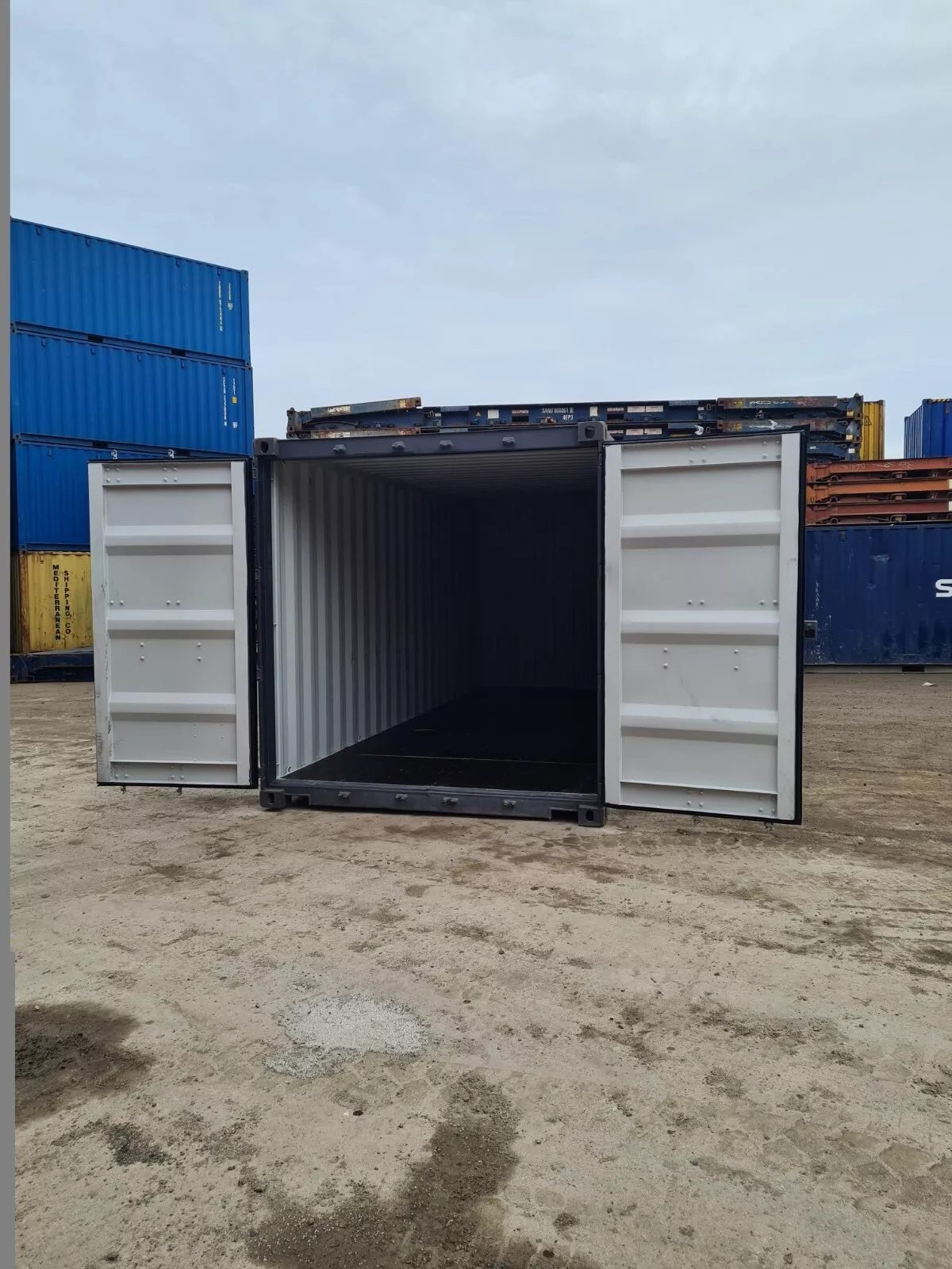 20ft One-Trip Shipping Container – Double Cargo Doors – front view with both cargo doors open and empty interior