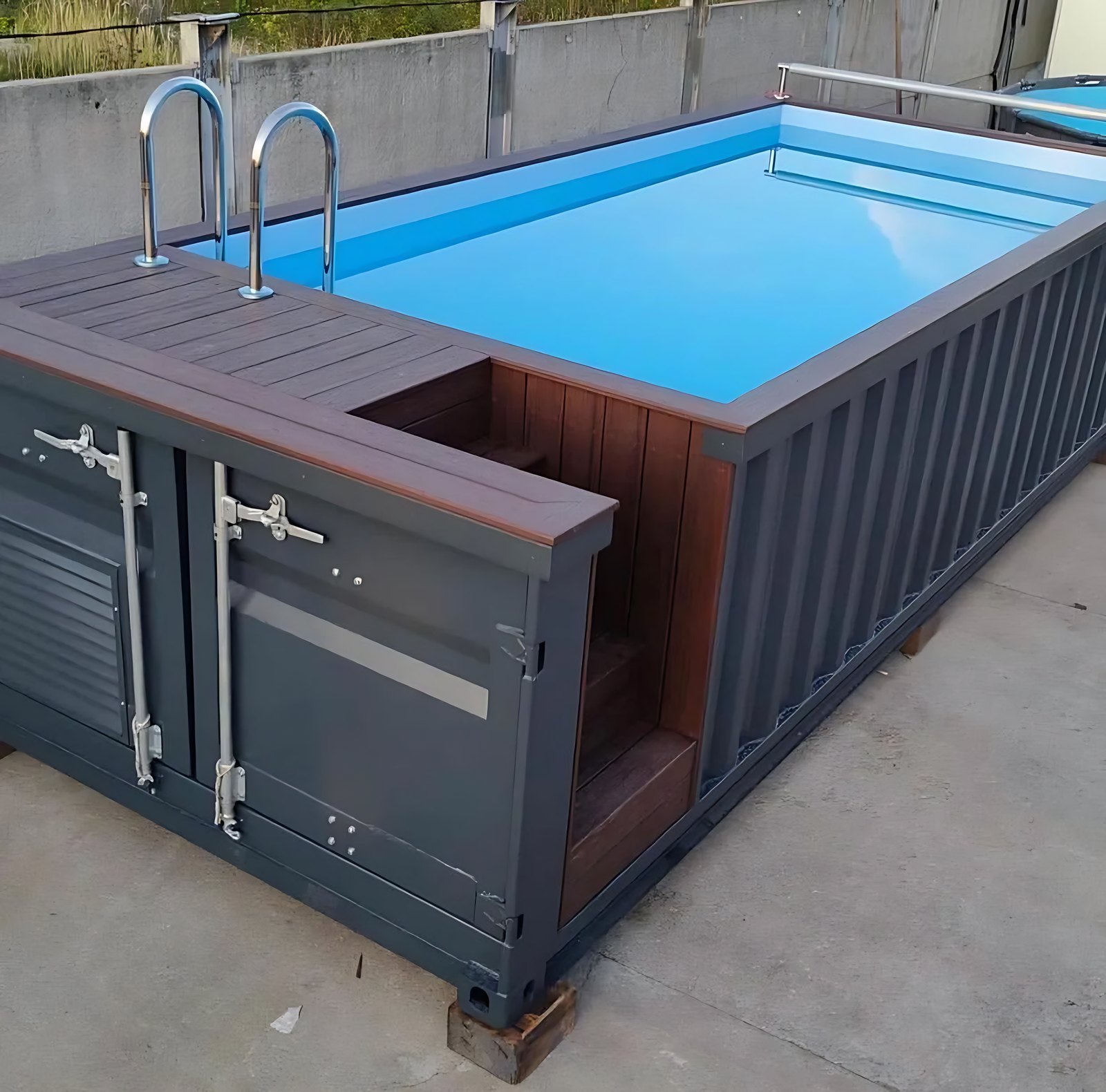 20ft Container Pool – Integrated Filtration and Access Steps – elevated exterior view of container pool with deck and ladder