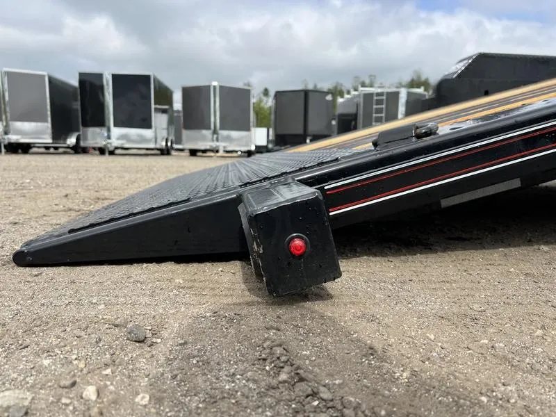 2024 Diamond C 24 ft Tilt Trailer – Spare Mount – Close-up of a small red LED marker light on the trailer frame