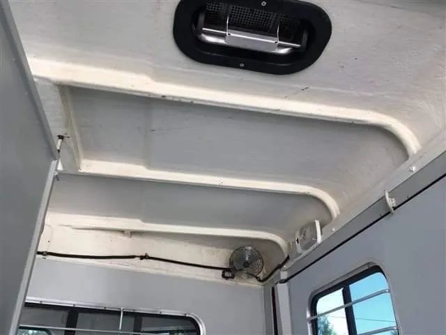 2007 Hawk 2 Horse Bumper Pull Trailer – Side Ramp – The interior ceiling of the trailer showing a vent, light, and fan