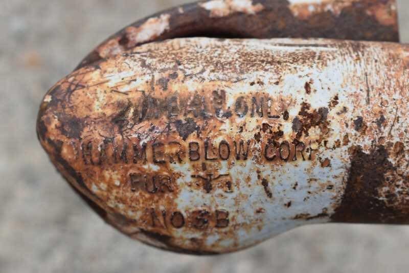 2001 CM Odyssey 2 Horse Trailer – Aluminum Floor – Close-up of a rusted metal trailer coupler with manufacturer markings