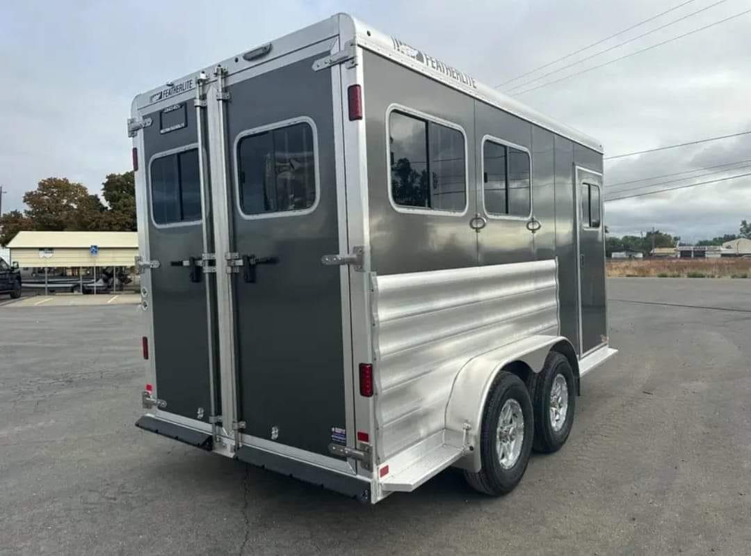 2012 Featherlite 9400 2 Horse Trailer – Removable Tack – Rear three-quarter view of the trailer showing closed double rear doors