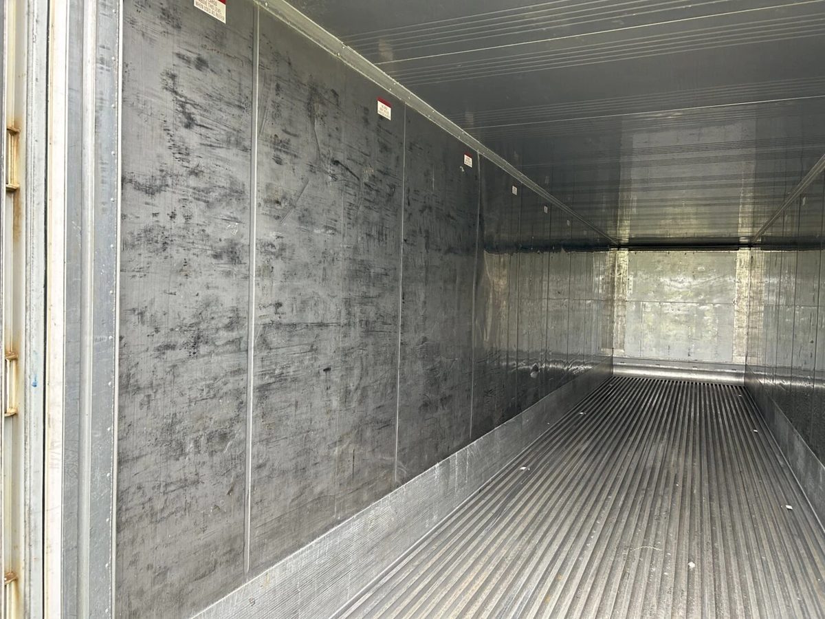40ft High Cube Refrigerated Container – Insulated Storage – empty refrigerated container interior with metal walls and ribbed floor