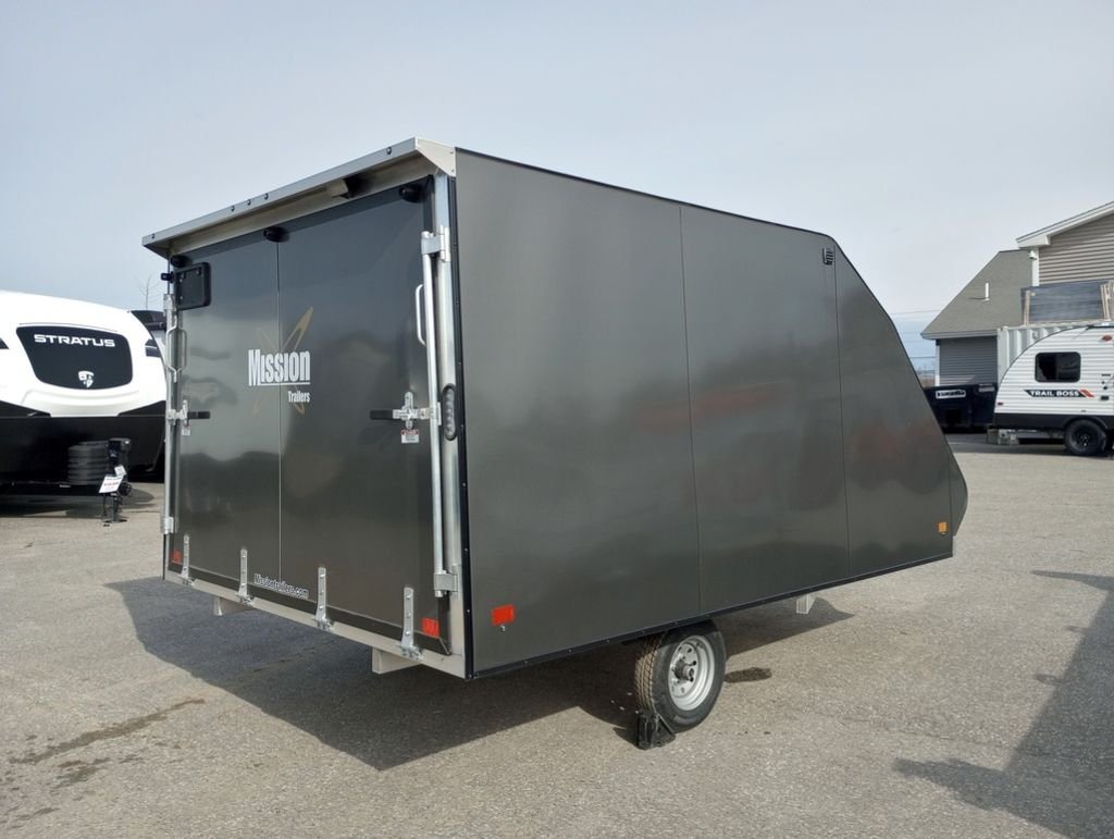 Mission Trailers Aluminum Crossover – Rear Canopy – Rear three-quarter view of the closed charcoal gray crossover trailer