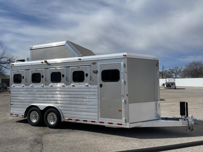 2016 Hart Ultimate 4 Horse Trailer – Champagne, Hay Pod – The right side profile of the horse trailer showing the main entry door