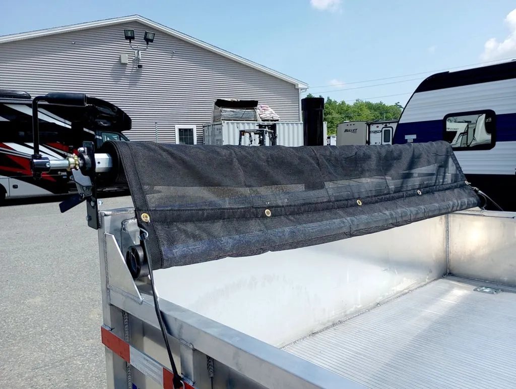 2025 Mission Trailers 16 ft Dump Trailer – Aluminum – Top view of the manual mesh tarp kit installed on the front bulkhead