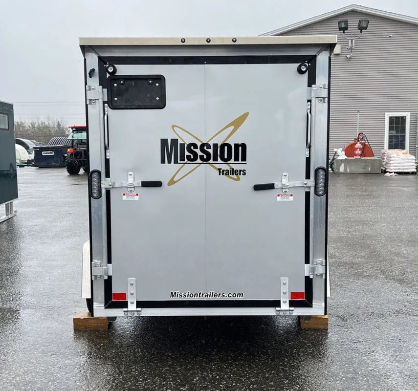 2024 Mission Trailers Crossover Trailer – Galvanized Package – Straight-on rear view of the closed ramp door with manufacturer logo