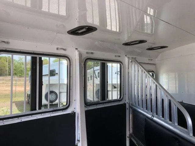 2010 Merhow 3 Horse Bumper Pull Trailer – Rear Ramp – Interior view looking at the ceiling vents and barred horse stall windows