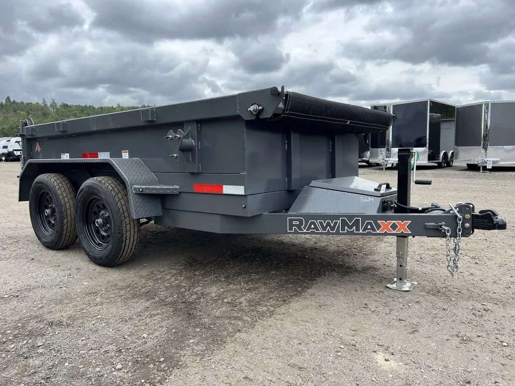 2024 RawMaxx 10 ft Dump Trailer – Shadow Grey – Three-quarter view from the front right side showing the tarp and hitch assembly