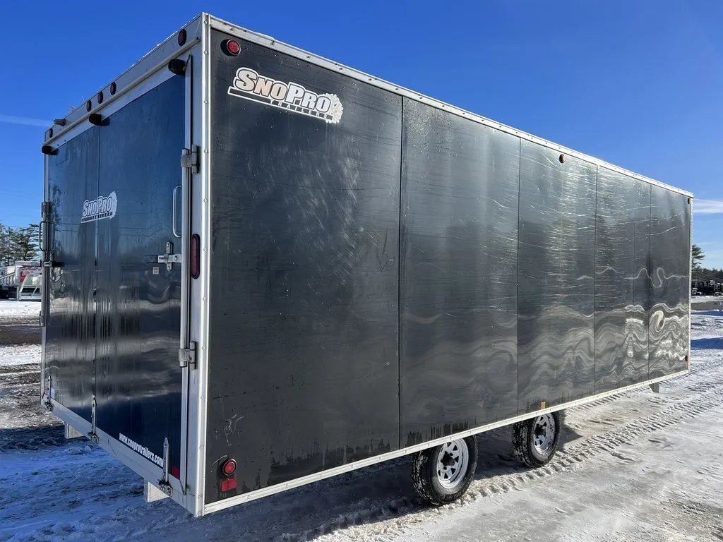 2008 Sno Pro 4-Place Snowmobile Trailer – Black Aluminum – Angular view of the rear and side with closed doors