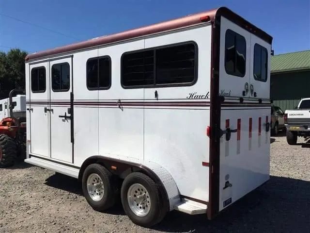 2007 Hawk 2 Horse Bumper Pull Trailer – Side Ramp – A rear three-quarter view of the trailer showing the doors and side profile