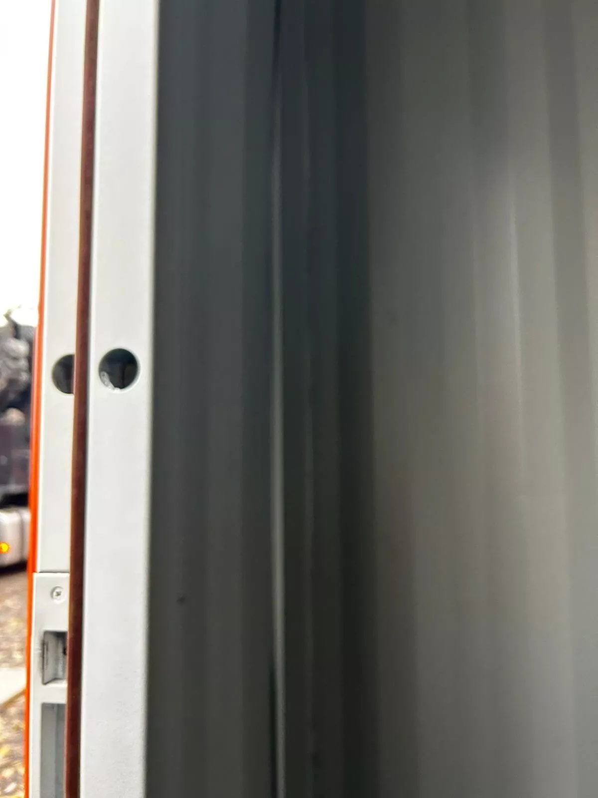 40ft Multi-Compartment Shipping Container – Individual Side Access – close-up of metal door frame and latch openings