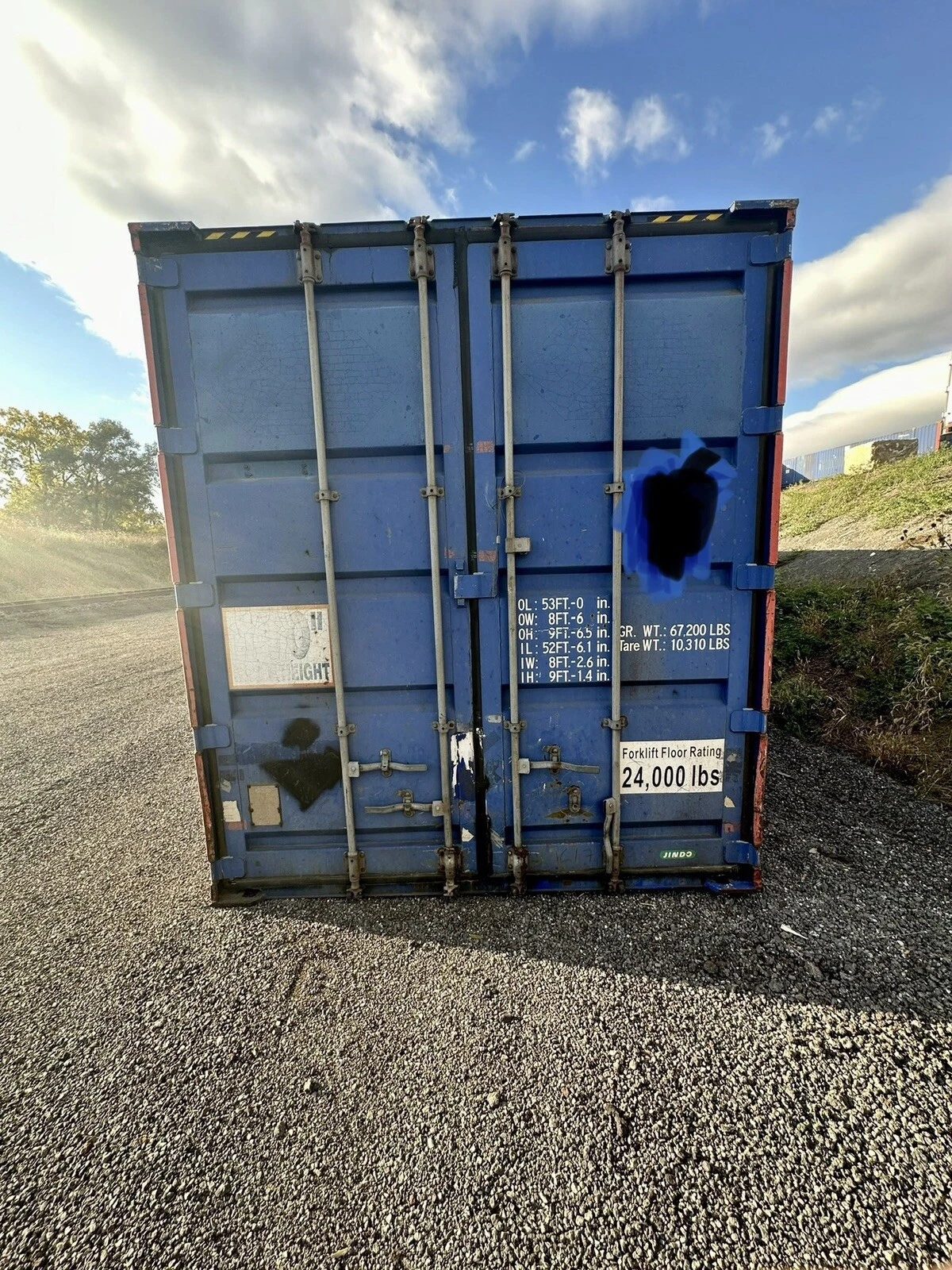53ft High Cube Steel Shipping Container – Double End Doors – Closed blue container doors with locking bars and weight markings