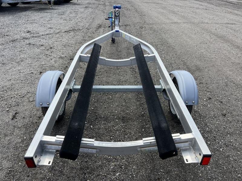 2020 Karavan Single-PWC Trailer – Aluminum, Adjustable Bunks – Rear view of the aluminum PWC trailer showing the bunks and frame