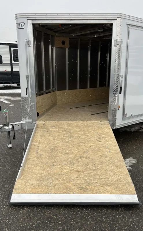 2024 E-Z Hauler 24 ft Trailer – Rear Canopy – Front ramp door in the open position showing the interior transition